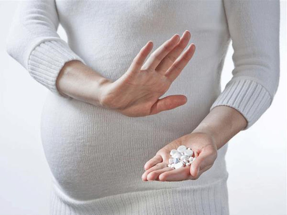 Mẹ bầu bị sốt khi mang thai có nguy hiểm cho thai nhi không? - Ảnh 3