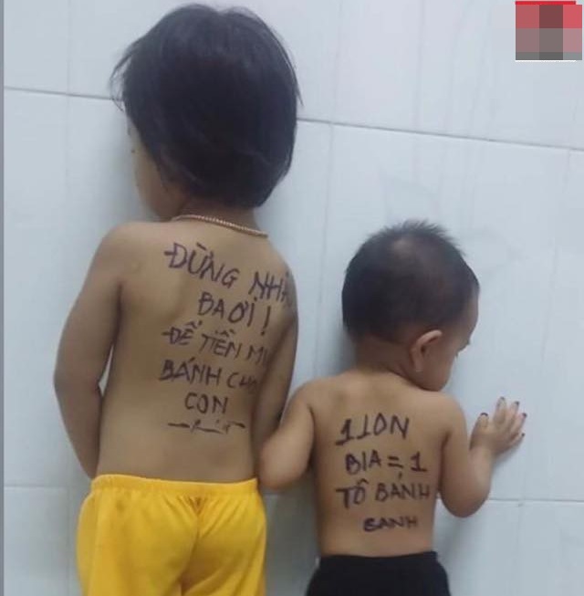 Lời nhắn 'ba ơi đừng nhậu' trên lưng hai đứa trẻ gây xôn xao mạng xã hội - Ảnh 1