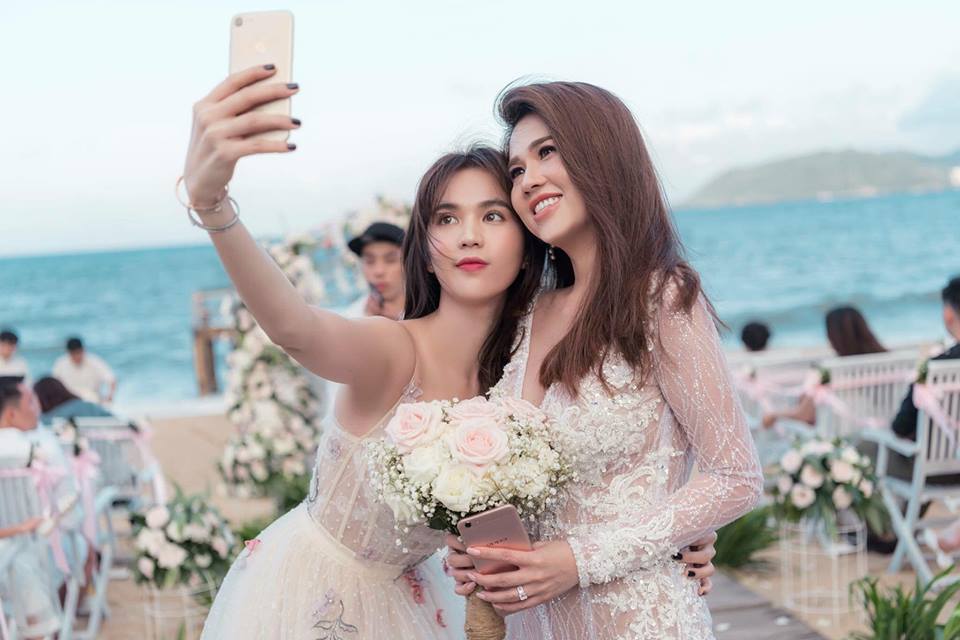 Chị gái Ngọc Trinh khoe vẻ 'nóng bỏng' trong đám cưới lần 2 ở Nha Trang - Ảnh 5
