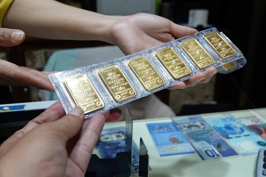 Giá vàng hôm nay 3/4/2024: Vàng tăng dựng đứng, vượt xa mức 81 triệu đồng/lượng - Ảnh 1