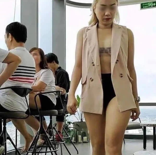 Người phụ nữ 'thích thả rông' ở Sài Gòn lại gây bão mạng khi đi chơi chụp ảnh “mặc áo cũng như không” gây tranh cãi - Ảnh 2