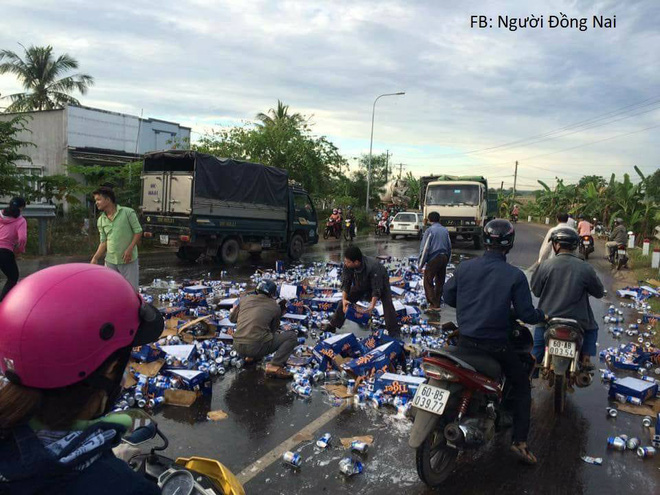 Chuyện tử tế: Hàng ngàn lon bia đổ ra đường, người dân chung tay thu dọn giúp tài xế - Ảnh 2