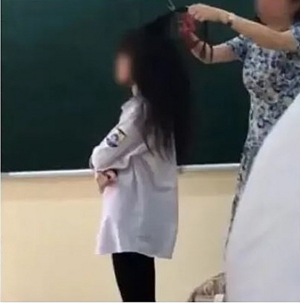 Vụ cô giáo cầm kéo cắt tóc nữ sinh để trừng phạt: Cha mẹ không bức xúc, thông cảm cho cô giáo - Ảnh 1