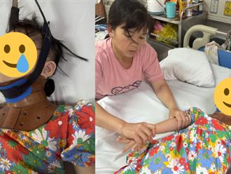 Xót xa hình ảnh bé gái 7 tuổi mắc bệnh Down bị ngã lệch đốt sống cổ, người mẹ không tiền phải xin về
