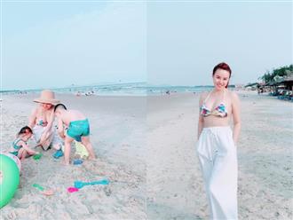 Mẹ 2 con Vy Oanh diện bikini khoe vòng 1 căng tròn, quyến rũ trước biển