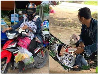 Người bố địu con nhỏ trước ngực, một tay chạy xe máy từ Đồng Nai về Hà Tĩnh tránh dịch: 'Bé nhớ hơi mẹ nên khóc mãi'