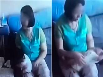 Lại xuất hiện clip trẻ sơ sinh bị bảo mẫu bạo hành dã man: 'Lắc mạnh tay để bé ợ hơi'