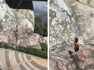 Nữ du khách leo xuống tận dưới bàn tay khổng lồ ở Cầu Vàng - Đà Nẵng khiến cộng đồng mạng chỉ trích ồn ào