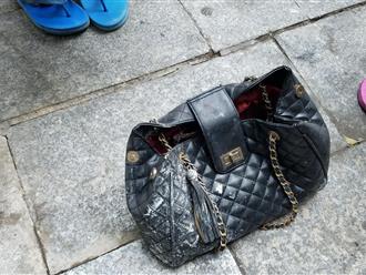 Cư dân nhặt được túi xách có chứa hơn 10 triệu đồng của cô gái bị tử vong trong đám cháy chung cư Carina